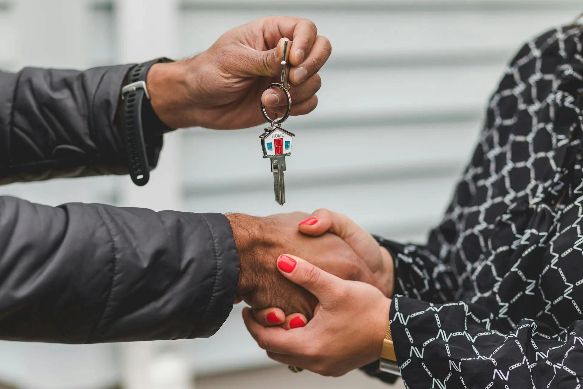 Buyers signing contract documents for an Atlanta luxury home purchase